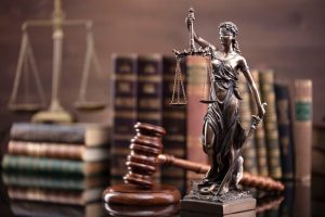 Judge’s gavel on a desk in a lawyer’s office, representing law and justice.