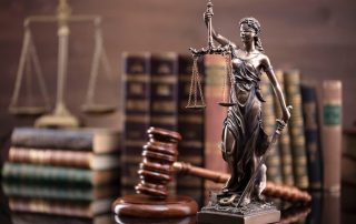 Judge’s gavel on a desk in a lawyer’s office, representing law and justice.